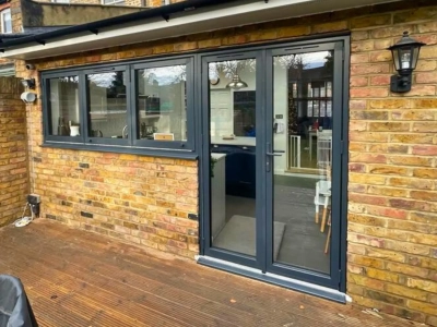 French-doors-with-side-windows-in-black-colour-kitchen-to-garden-door-french-door-idea-window-idea-Durajoin-WIndows-and-Doors